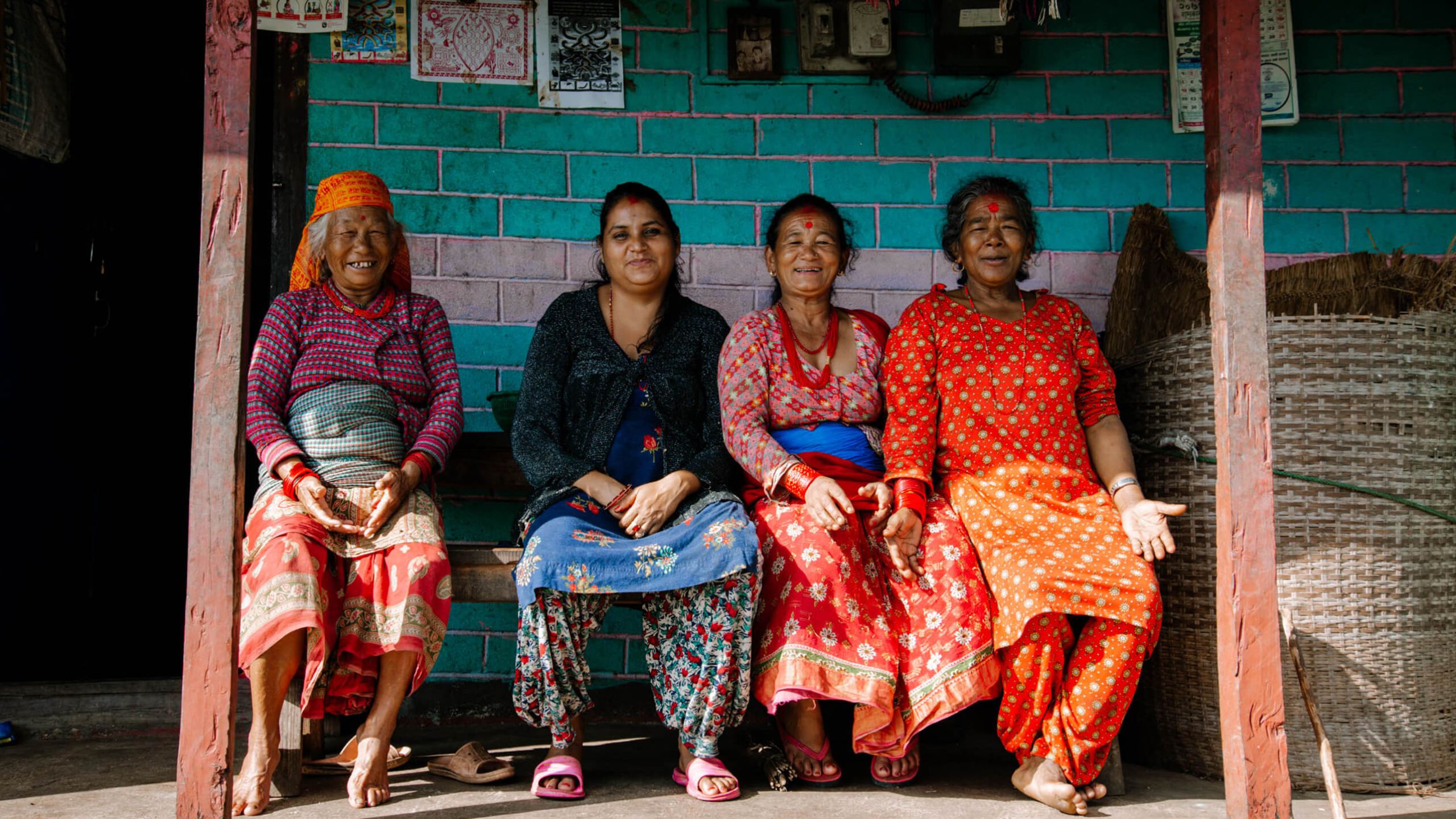 Image: Nepali women sitting in front of a house